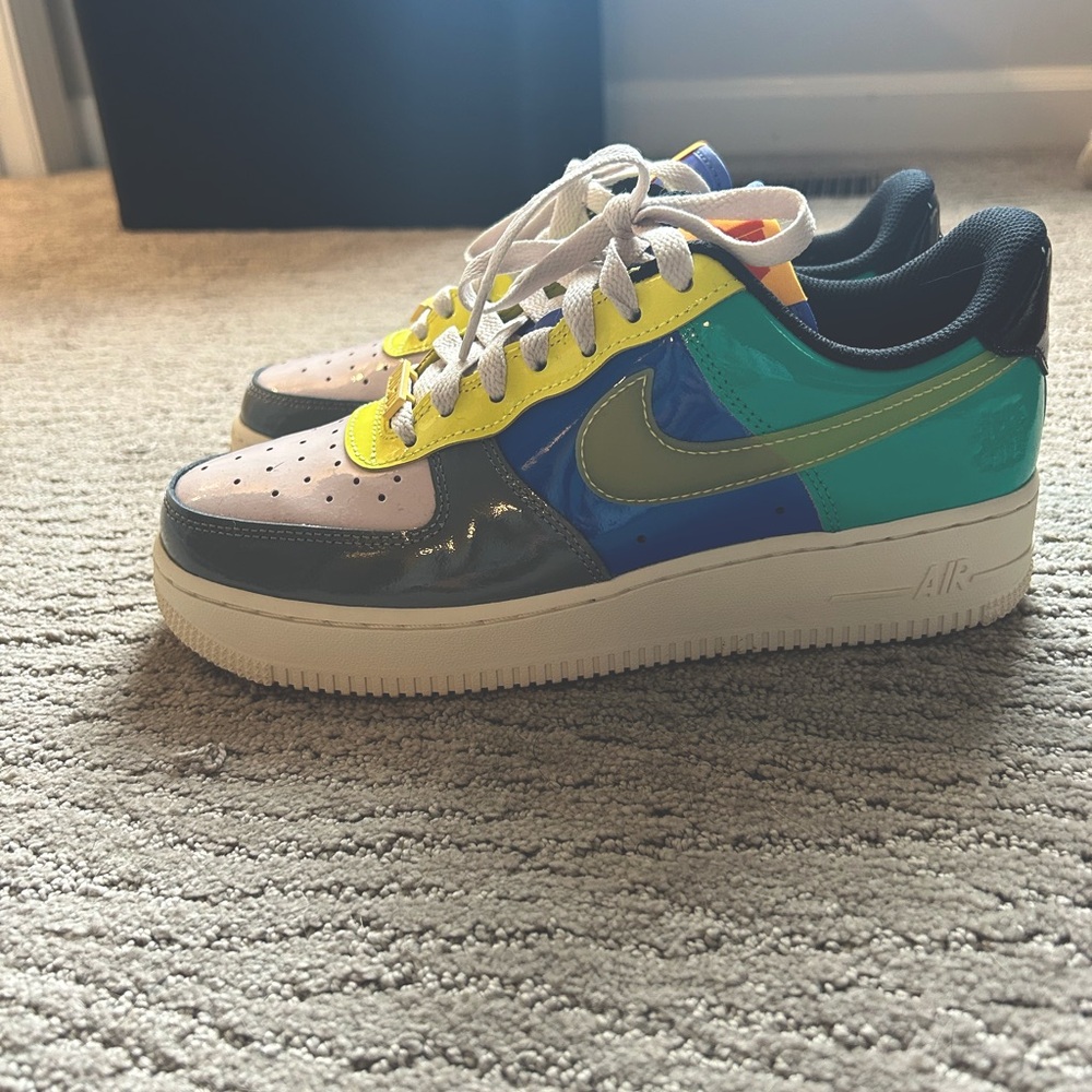 Nike X Undefeated Air Force ones Men’s 6.5, women’s 8